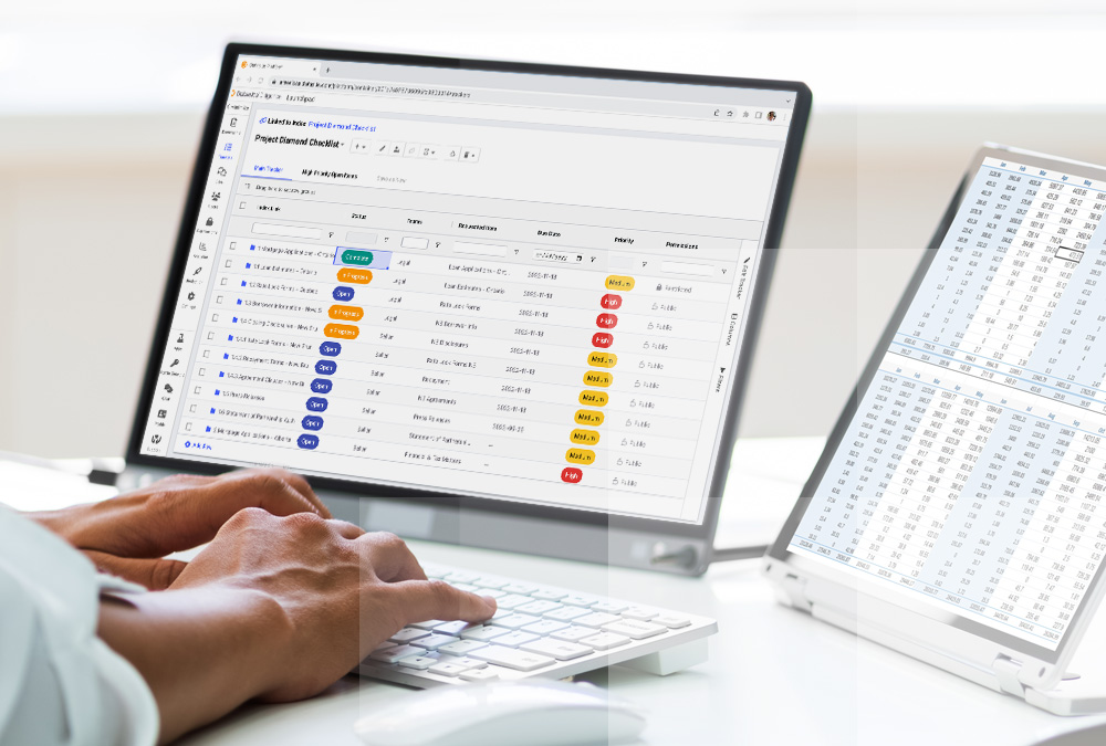 M&A professional taking advantage of Datasite's trackers checklist