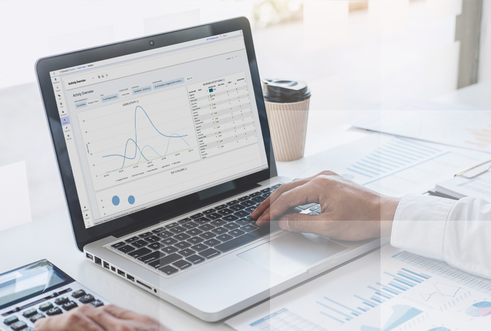 Laptop screen depicting M&A activity levels with Datasite