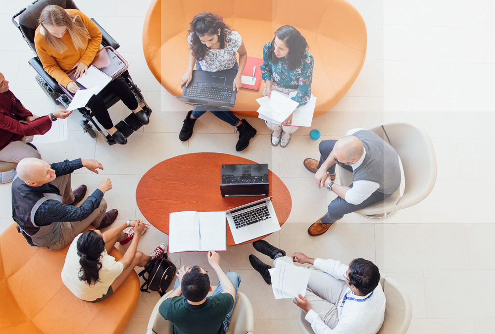 Colleagues using Datasite's online data room during a discussion